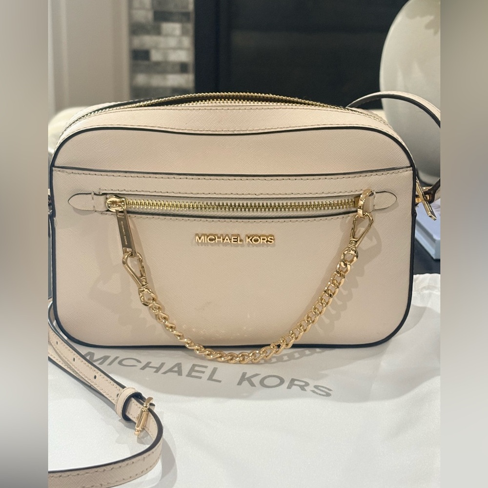 Michael Kors Light Pink Crossbody Bag with Gold Chain EUC with MK dust bag.